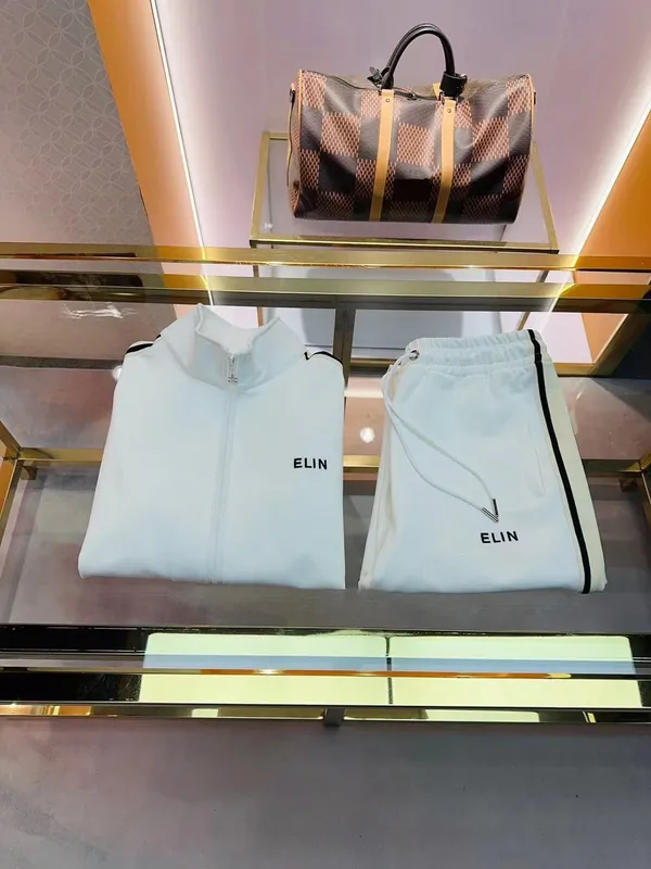 Chándales de marca de alta calidad para hombre, diseño de costura a rayas a la moda, ropa deportiva con cremallera, chándal de d
