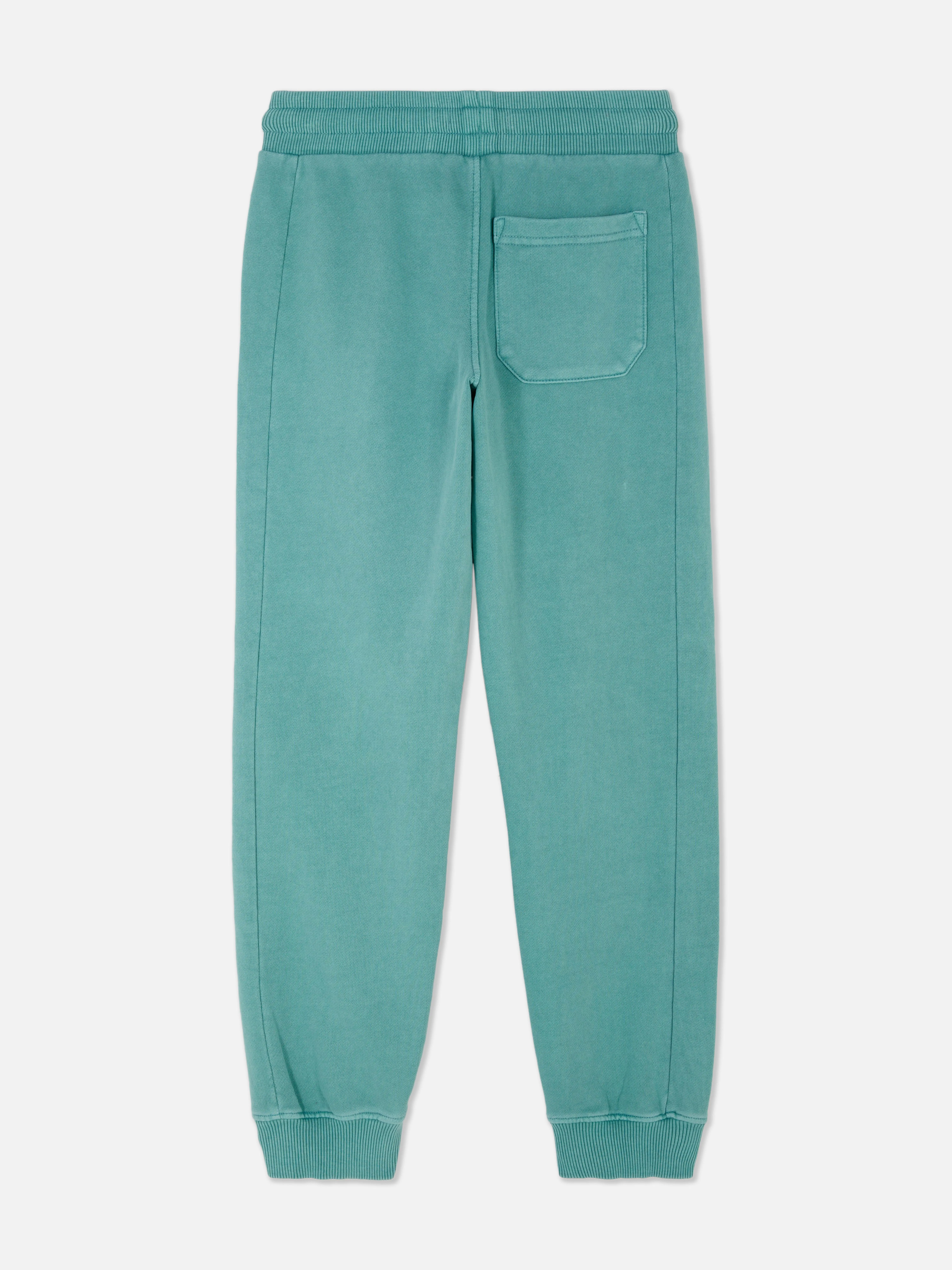 Joggers de punto bordados