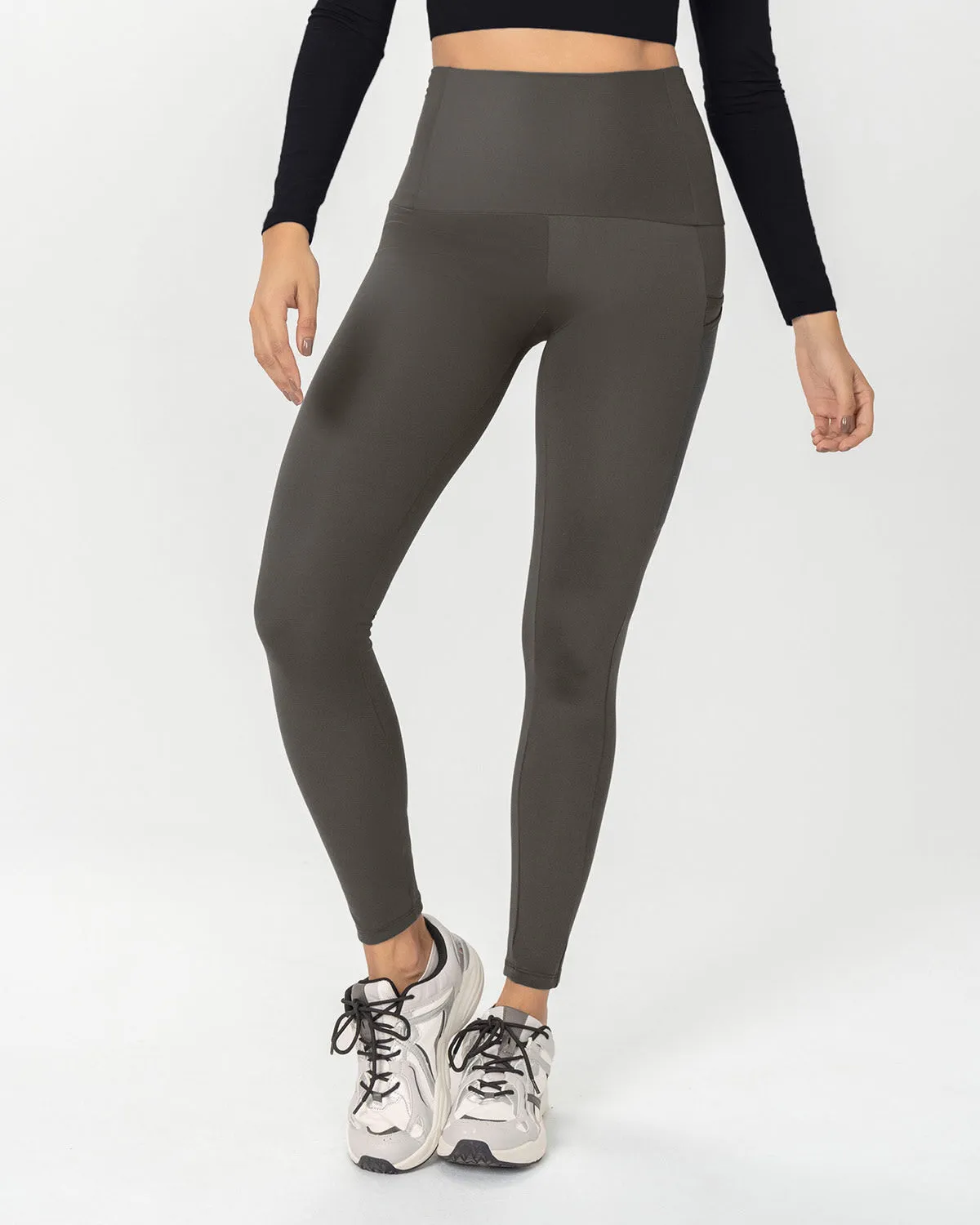 Legging deportivo de compresión con práctico bolsillo lateral