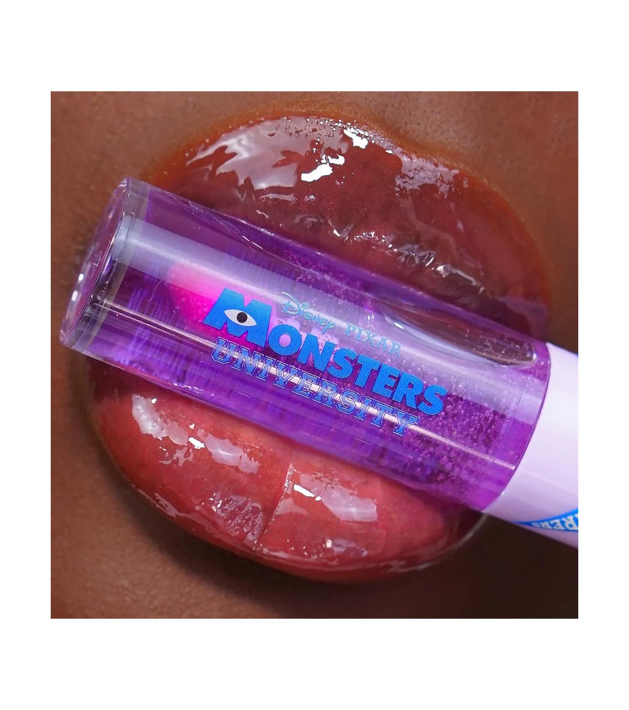REVOLUTION  *MONSTERS UNIVERSITY*  ACEITE LABIAL CAMBIO DE COLOR RANDALL INVISIBLE LIP OIL