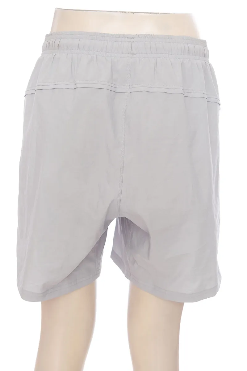 ROPA DEPORTIVA COLOR GRIS  UNDER ARMOUR