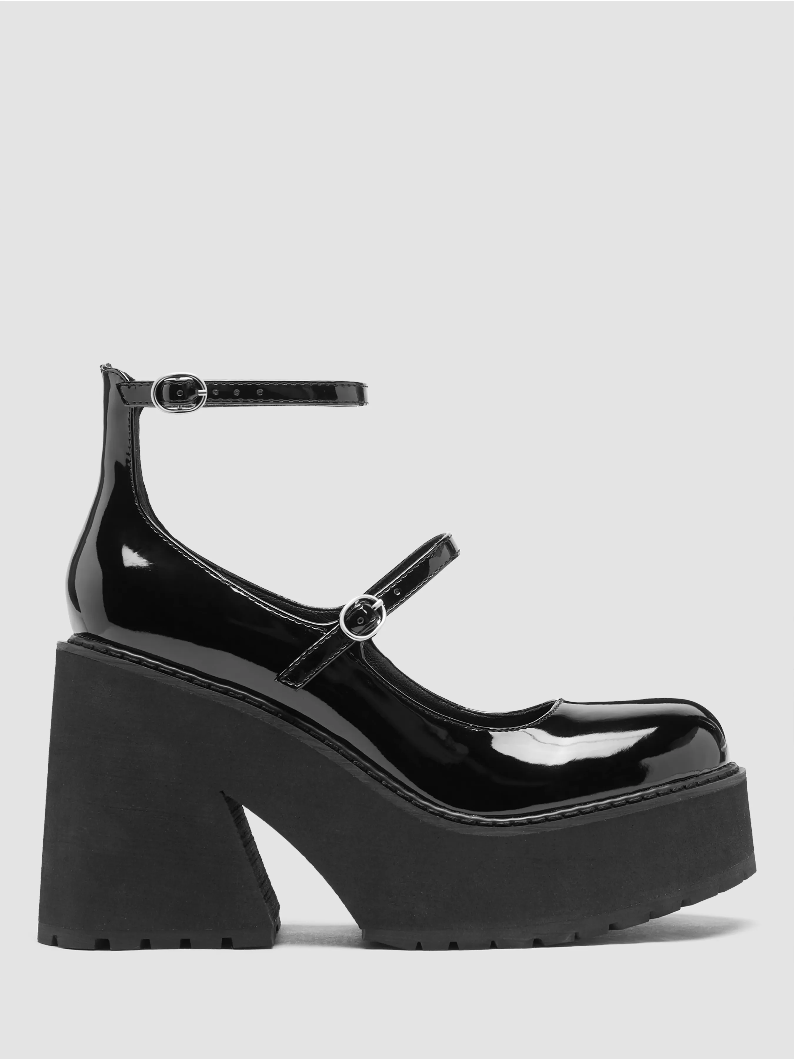  Zapatos tipo merceditas con doble correa y tacón grueso