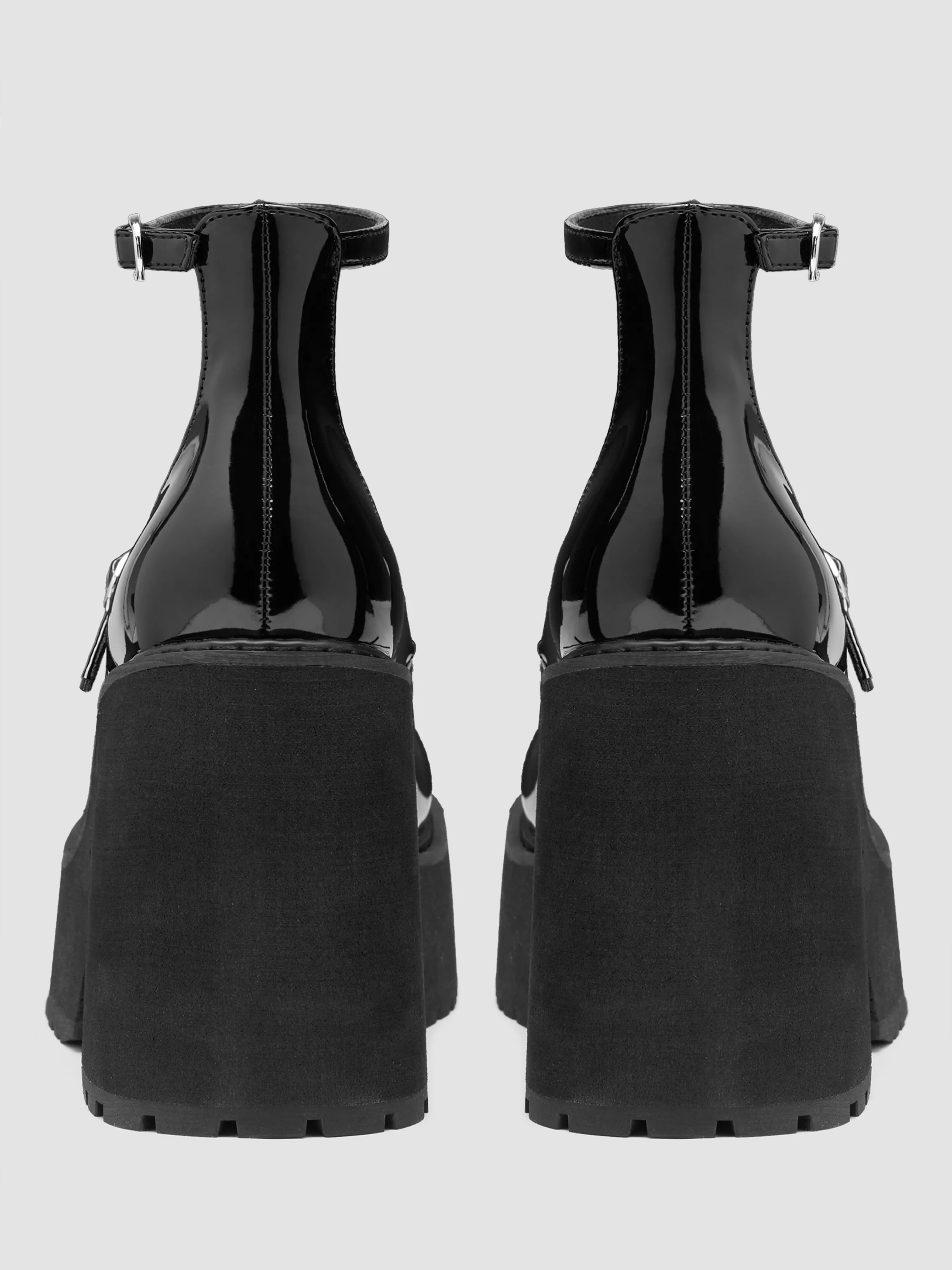  Zapatos tipo merceditas con doble correa y tacón grueso
